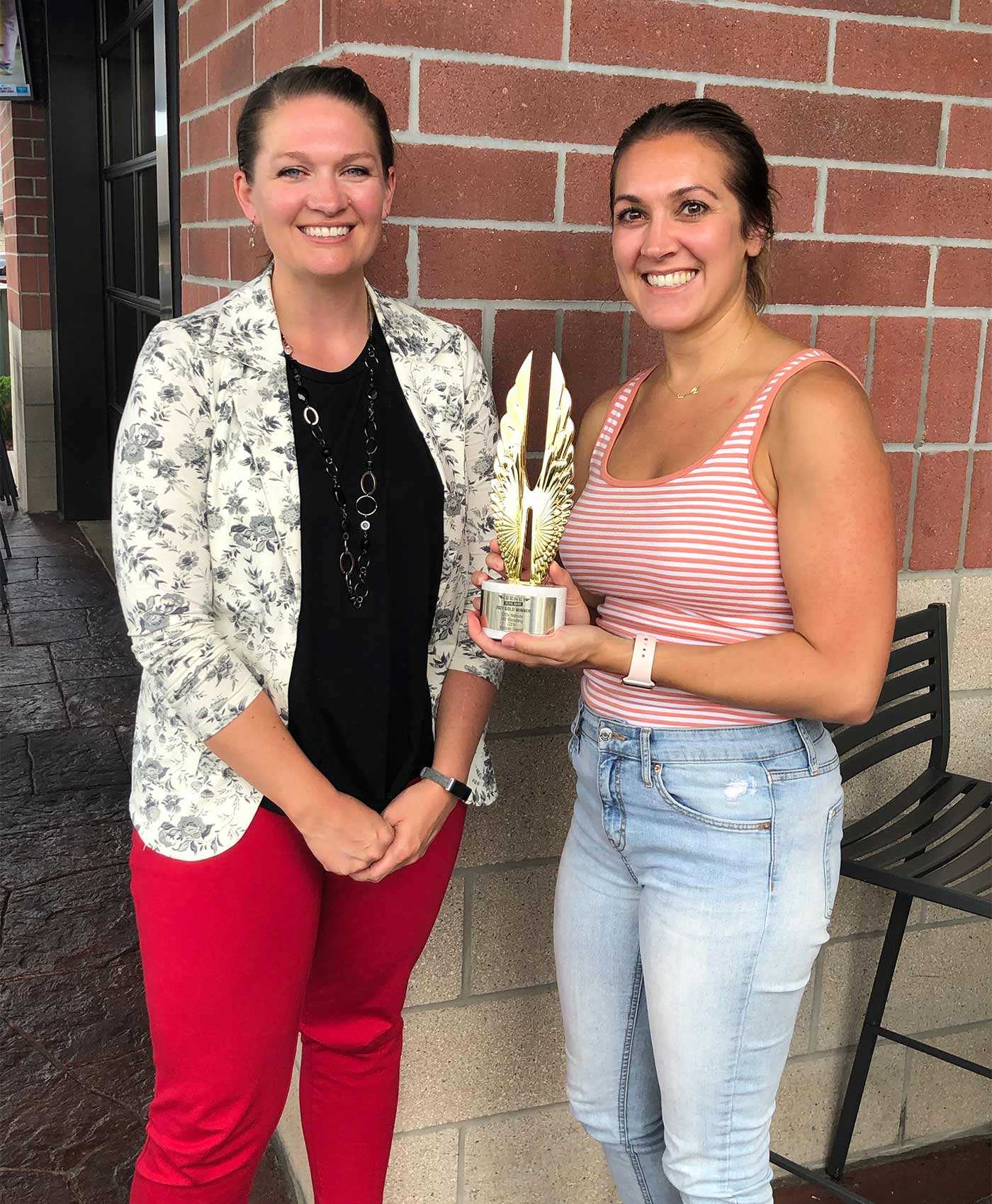 LKF Marketing Wins Hermes Award for C2Dx Website representatives with award